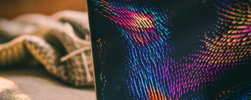 MacBook Pro screen showing abstract lines